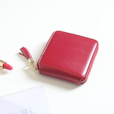 China Portable Fashion Women Kids Girls Leather Coin Purses Holders Zipper Money Bag Pouch Kids Small Wallets for sale