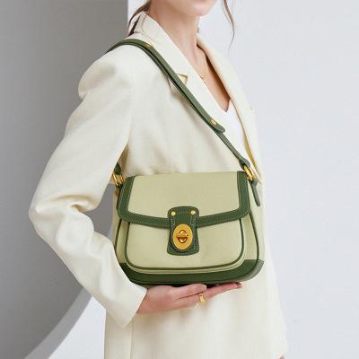 China 2022 Summer New Fashion Minority Design Saddle Bag Female Green Bag Single Permutation Simple Messenger Armpit Shoulder Bag for sale