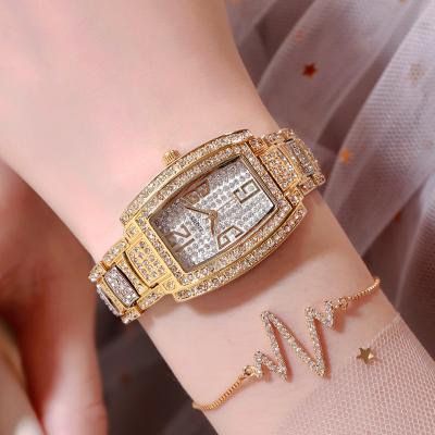 China Automatic Date Women Watches Alloy Iced Out Three Hand Quartz For Ladies Watch for sale