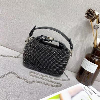 China Luxury high quality fashion rhinestone money purse and bling for women fashion design 2021 new money purse party bling bag for sale