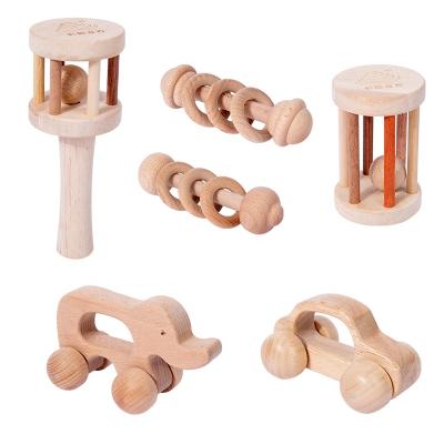 China New Beech Small Stroller Hand Rattle Wooden Rubber Wooden Rattle Can Chew Creative Wooden Toys Crafts For Children Teeth Sticks Animals for sale