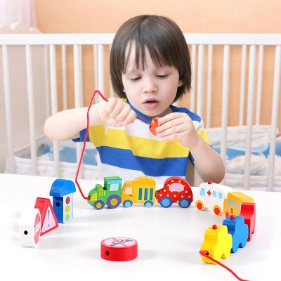 China Construction Toy Children's Fun Transport Animal Theme Threading Beaded Building Blocks Stringing Music Beading Portable Toys for sale