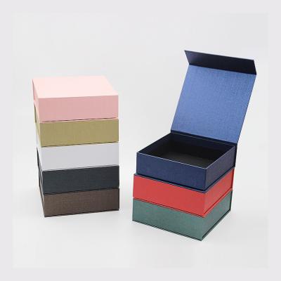 China Recyclable Delicate Appearance Customized Magnetic Fashion Attractive Design Blue Oil Perfume Bottle Kraft Paper Cardboard Storage Box for sale