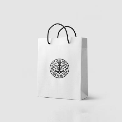 China Customized Handmade White Kraft Paper Shopping Bags With Logo for sale