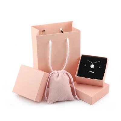 China Custom Recyclable Small Pink Cardboard Ring Packaging Jewelry Packaging Box And Paper Bag With Custom Logo Printed For Little Girls for sale