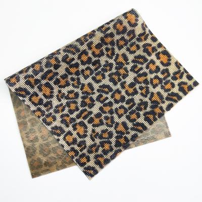 China Leopard Print Glass Crystal Mesh Sheet Hot Fix Adhesive Durable Rhinestone Stickers for sale