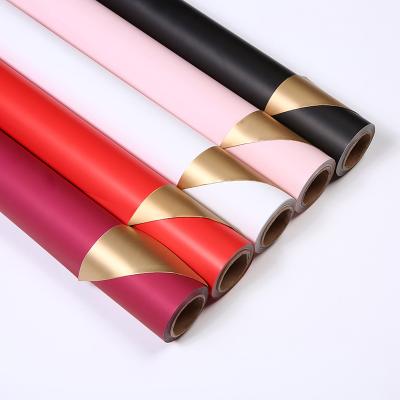 China 58cm*10m Biodegradable Wholesale Double Sided With Gold Fresh Flower Korean Waterproof Kraft Paper Roll for sale