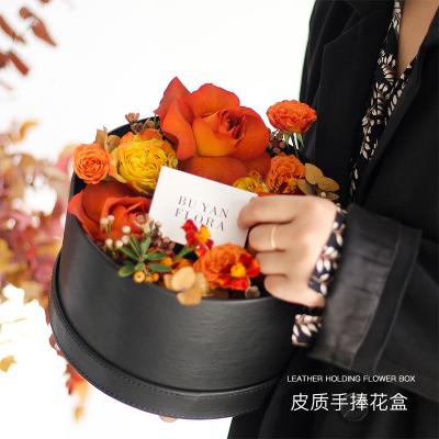 China Fashion recyclable high quality round new design lixury leather flower bouquet packaging box for sale