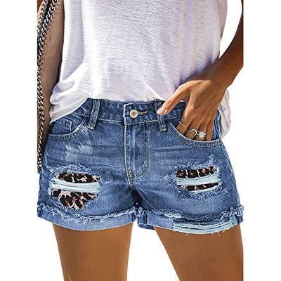 China Summer Sustainable Womens Denim Shorts Light Blue Mid Waist Pockets Buttons Hole Print Vintage Button 100% Cotton Denim Shorts for sale