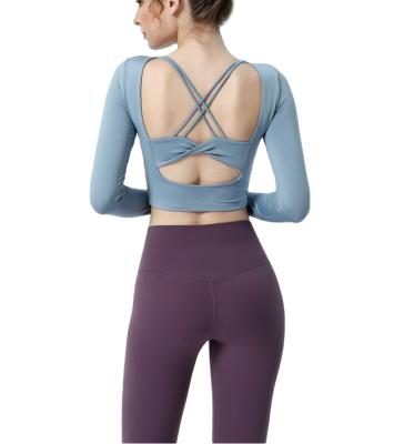 China Breathable Hollow Cross Back Tight Running Top Long Sleeve Fitness Womens Yoga Top for sale