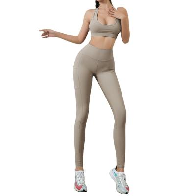 China Breathable Women's High Elastic Stretch Yoga Suit Set Beautiful Back Bra Pants Sports Fitness Suit Working Two Piece Set for sale