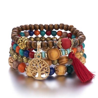 China Hot Selling BOHEMIA Women's Stackable Bohemian Tree of Life Multilayer Stretch Bracelet Set Statement Tassel Bracelets Wooden Bead Round Bracelet for sale