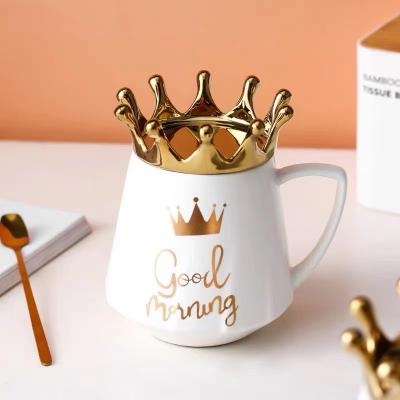 China Creative Viable Stand Lid Mobile Phone Crown Ceramic Coffee Mug With Shape Crown Shape Gold Lid for sale