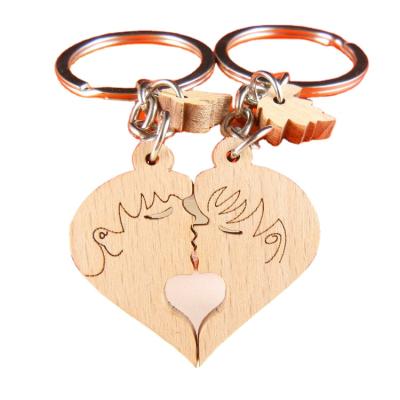 China Newest Promotion Gift Key Chains White Wooden Wooden Ring Chain Pendant Light Lamp Christmas Bead Key Ring Manufacturers Key Chain For Engraving for sale