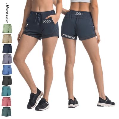 China Xsunwing QUICK DRY 2021 New Summer Yoga Sports Cycling Shorts With Side Pockets Hide High Waist Workout Fitness Gym Clothing Women for sale