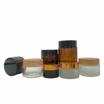 China Cream Custom Design Empty Round 20ml/30ml/50ml Cosmetic Packaging Face Cream Amber Glass Jar for sale