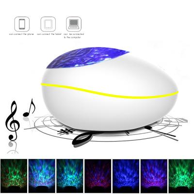 China Lucky Stone Ocean Starry Sky Wave Projector Night Light Modern Lamp Music Player Remote Control Colorful Led Projection for sale