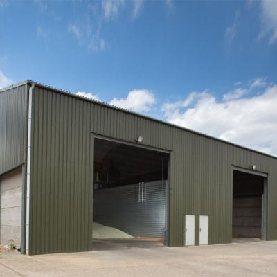 China Industrial Low Cost Prefab Metal Buildings Steel Structure Farm Storage Warehouse for sale