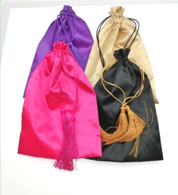 China Popular gold hair extension silk jewelry/hair packaging bag silk bag tassel small brand good quality silk bags for sale