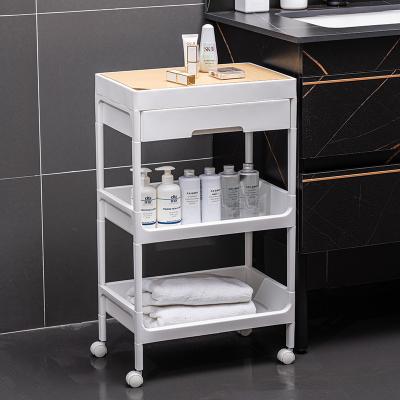 China Durable Practical 3 Layers Plastic Kitchen Trolley Household Serving Trolley Hotel Room Rack Storage With Wheel for sale