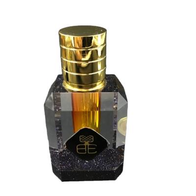 China New Design Fancy Personal Care Essence Bottle With Crystal Base Glass Bottle For OUD Oil for sale