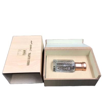 China Custom Wooden Gift 3ml 6ml 12ml Essence Oil Tola Glass Bottles Package Box for sale