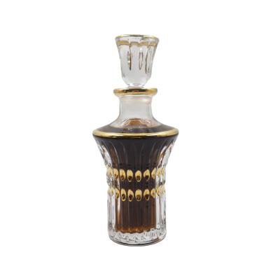 China 150ML Crystal Glass Attar Oud Oil Perfume Personal Care Arabic Display Bottle Glass Gold Paint Decanter for sale