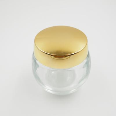 China Personal Care 100G Bakhoor Clear Jar With Gold Aluminum Cap Custom Cream Jar Bottle Glass Set for sale