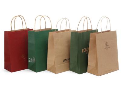 China Debossing Twisted Handles Colored Paper Bags / Recycled Shopping Bags for sale