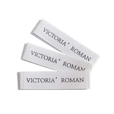 China Sustainable Woven Label For Clothes Fabric Woven Apparel Label Washing Head Label For Textile for sale