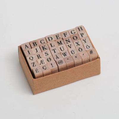 China Best Quality Hot Sale Eco-Friendly Custom Letter Wooden Stamp Set of Logo Wooden Handle Rubber Stamp 26 for sale