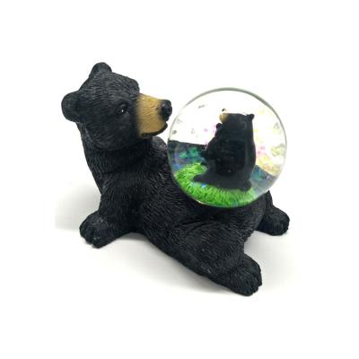 China Custom Resin Animal Souvenir 45mm Black Bear Snow Globe From Africa for sale