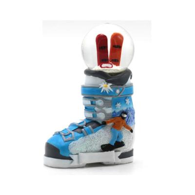 China Customsized Resin Snow Mountain World Souvenir Snow Boots Sprinkle Snow Globe for sale