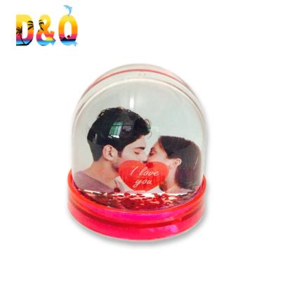 China Worldwide Wholesale Acrylic Plastic Photo Frame Snow Globe With Photo Insert for sale