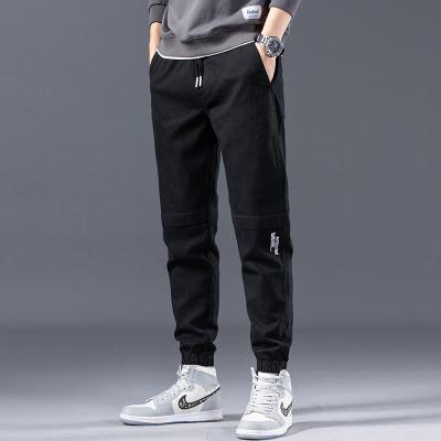 China Fashion Breathable Drawstring Autumn Trousers Casual Pants 2021 Loose Solid Pants Men's Sports Casual Trousers for sale