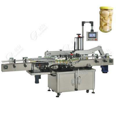 China Automatic CLOTHING Sleeve Laber Machine Shrink Labeling Machine For Round Bottles for sale