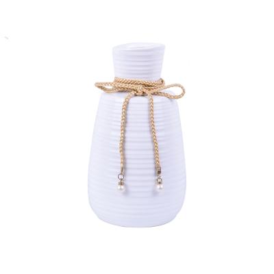 China Minimalist Vases Home Decor For Weddings White Ceramic Flower Vase for sale