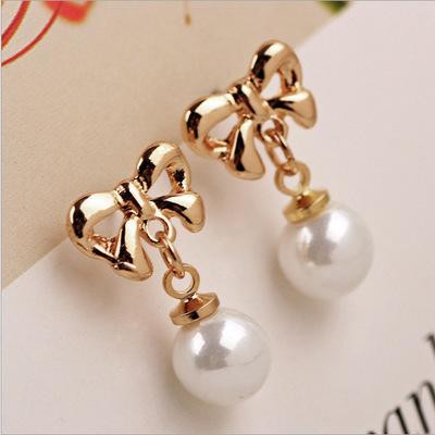 China CLASSIC Hot Sale Cute Gold Plated BowKnot Stud Earring Hanging High Bright Pearl Drop Earrings for sale