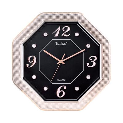 China Factory direct sales luxury gold octagon fancy timing plastic wall clock for living room decoration for sale