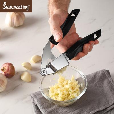 China Sustainable Hot Selling Practical Kitchen Tool Food Grade Chrome Plated Garlic Press For Home Kitchen for sale