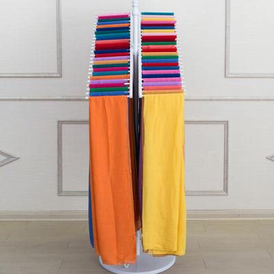 China Floor-standing Multi-Layer Scarf Display Cloth Rack Metal Carpet Cloth Display Stand for sale