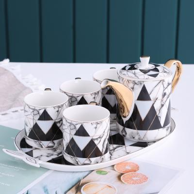 China New Design Viable Luxury Ceramic Teapot Set QYD Bone China Tea Set Tea Cup Set Bone China Tea Set With Tray Holder for sale