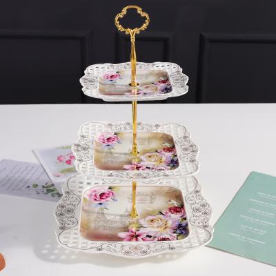 China QYD Mental Bone China Wedding 3 Tier Dessert Cake Stand Set Square 2 Tier Serving Dish Viable Floral Fine Ceramic Gold Platter for sale