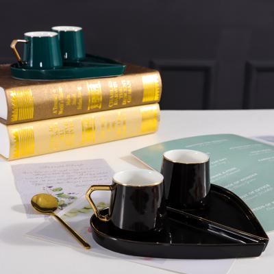 China Wholesale QYD Viable gold cute lover European personalized black green seramic coffee cups saucer set 90ml with custom logo for sale