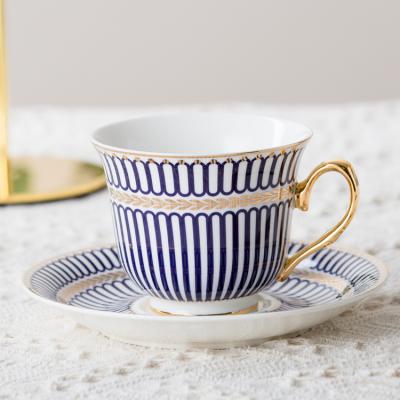 China QYD Viable Subordinate Elegant Line Printed New Design Bone Tea Cups Cheap Chian Ceramic Coffee Cup And Saucer for sale