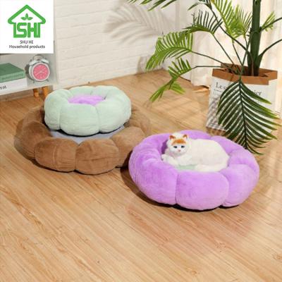 China Dropshipping Sustainable Removable Pet Cushion Waterproof Pet Cats Bed Fluffy Fur Donut Dog Bed for sale