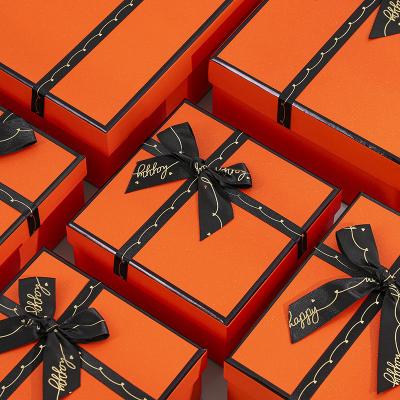 China Recyclable High Level Orange Cosmetic Gift Box Gift Bag For Wedding Free Souvenir Gift Bag for sale