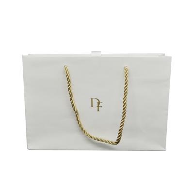 China Recyclable Bespoke Standard Size Shopping Bags With Handle Rope Jewelery Collapsible Durable Paper Bag With Gold Foil Logo for sale