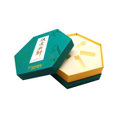 China Recycled Materials Rigid Hexagon Shaped Cardboard Essential Oil Gift Packaging Boxes Hexagonal Cosmetic Lid And Foundation Serum Box With Sponge Insert for sale