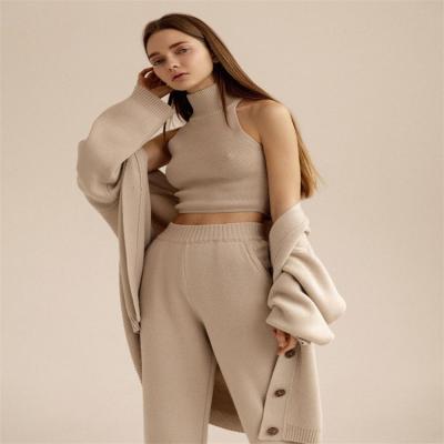 China Anti-wrinkle turtle neck high quality sexy vest knitted cashmere sweater cardigan long plus size women cos sweater set for sale